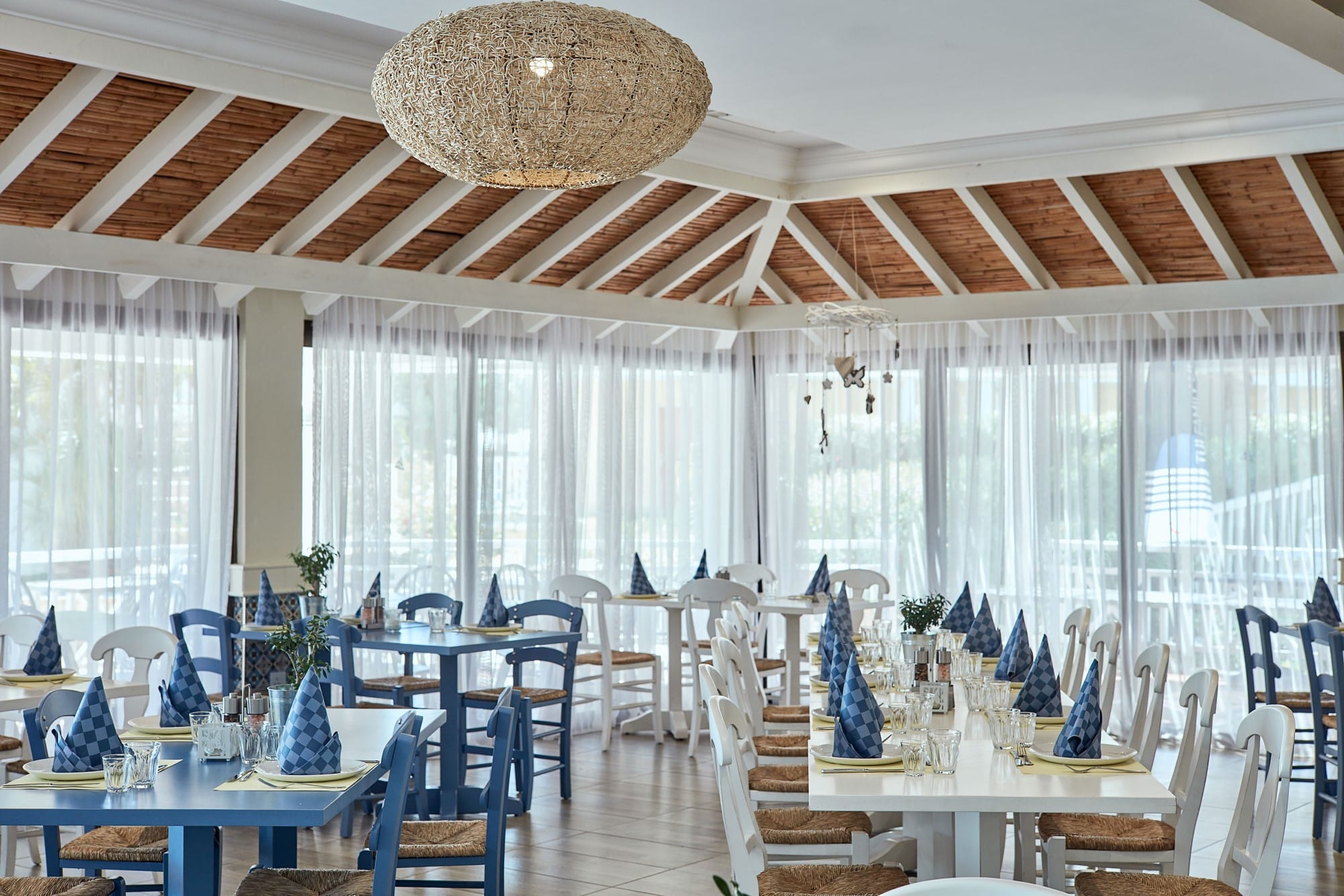 a room with tables and chairs