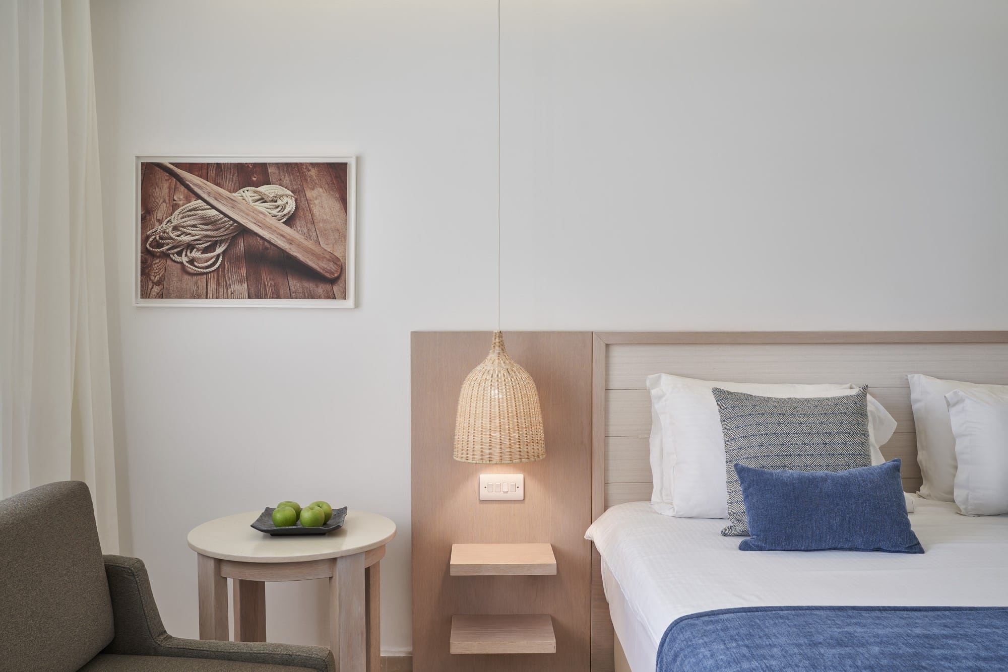 a room with a bed and a lamp
