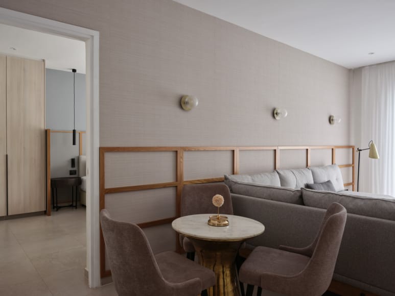 a room with a table and chairs