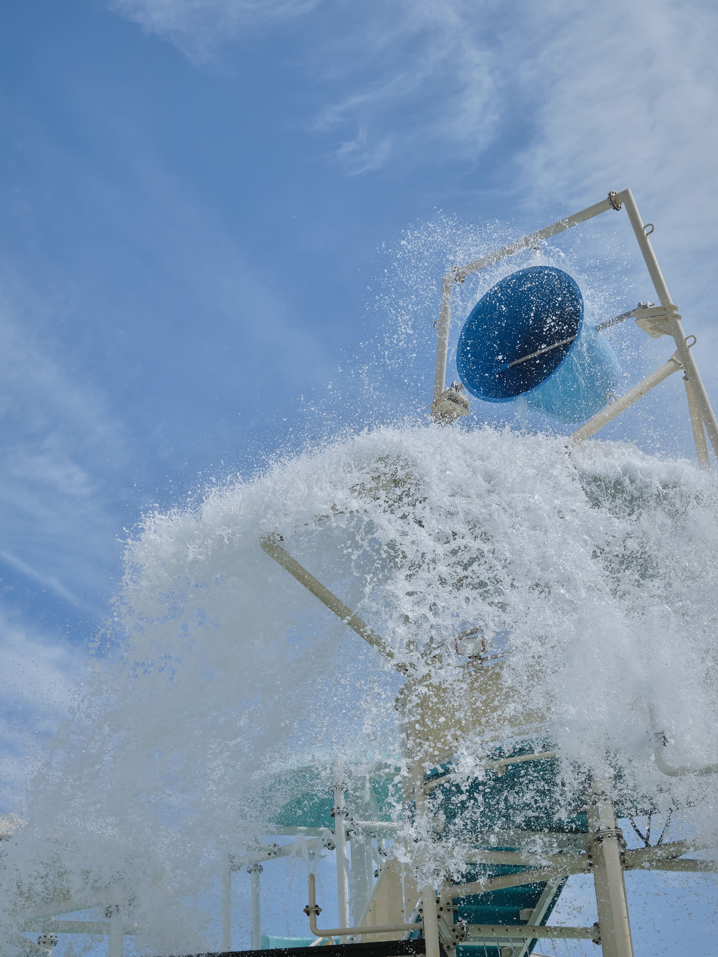 a large oil rig with smoke