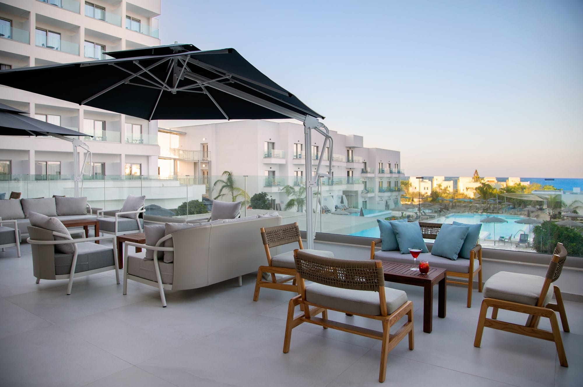a patio with a table and chairs
