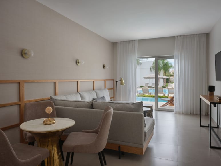 a living room with a couch and a table