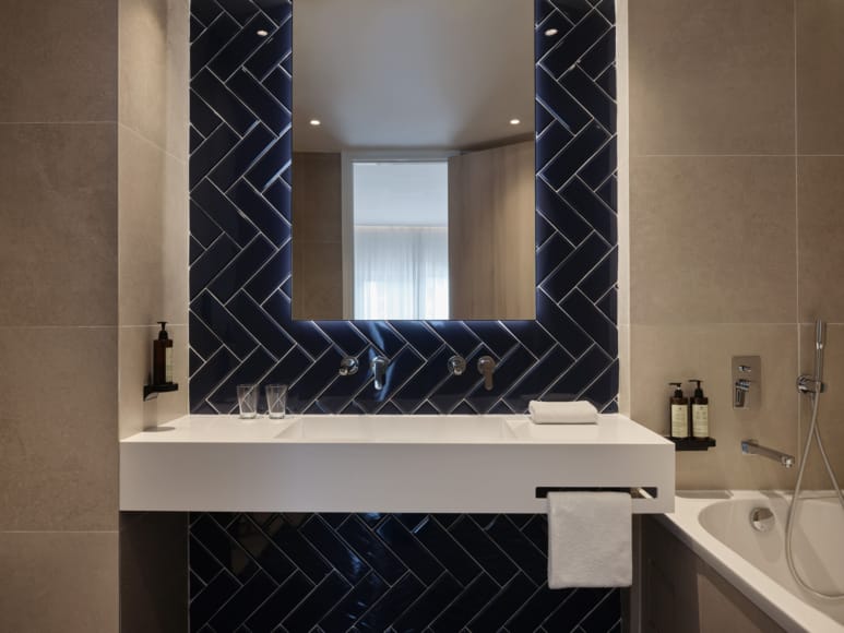 a bathroom with a large mirror