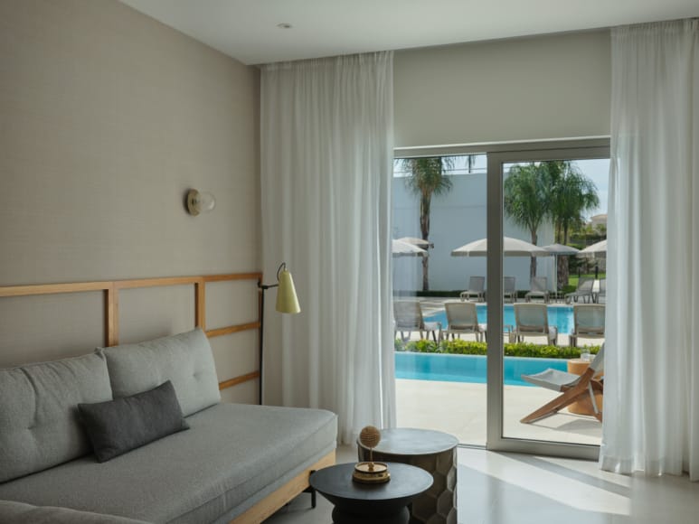 a bedroom with a pool