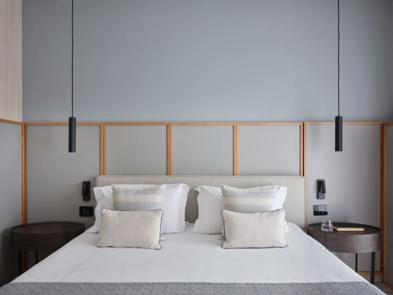 a bed with white pillows