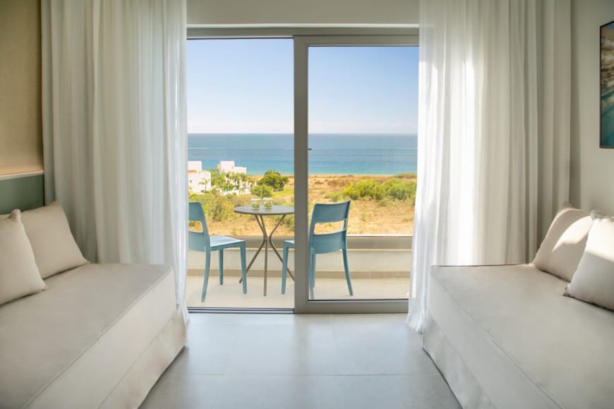 a room with a table and chairs