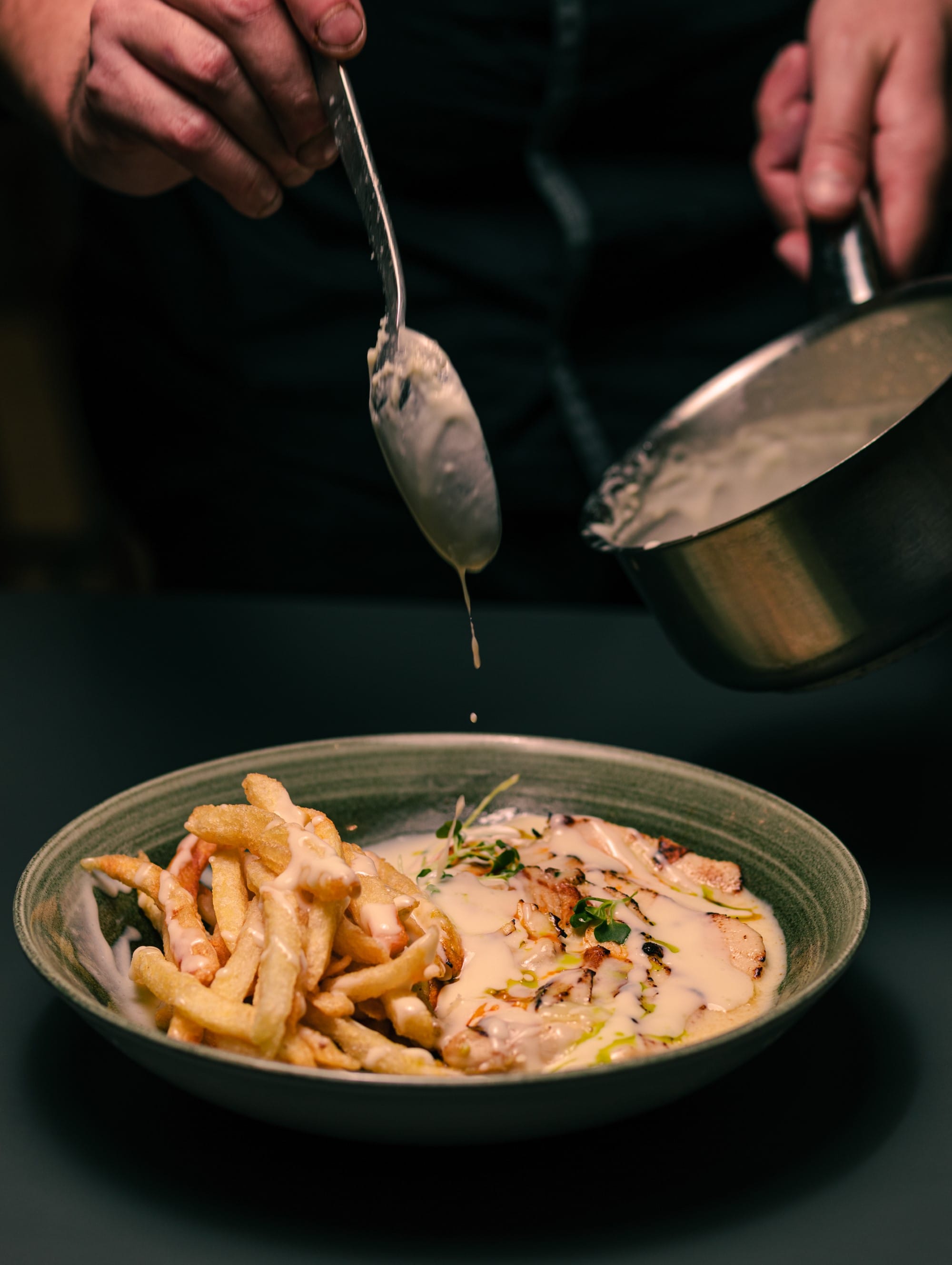 a person eating spaghetti with a fork