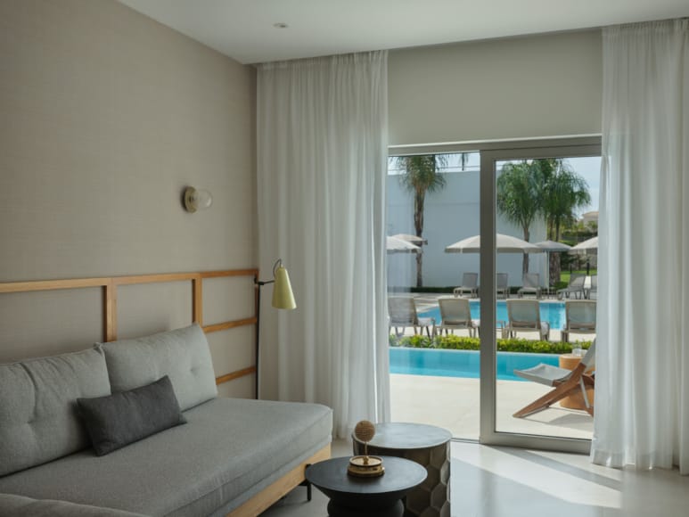 a bedroom with a pool