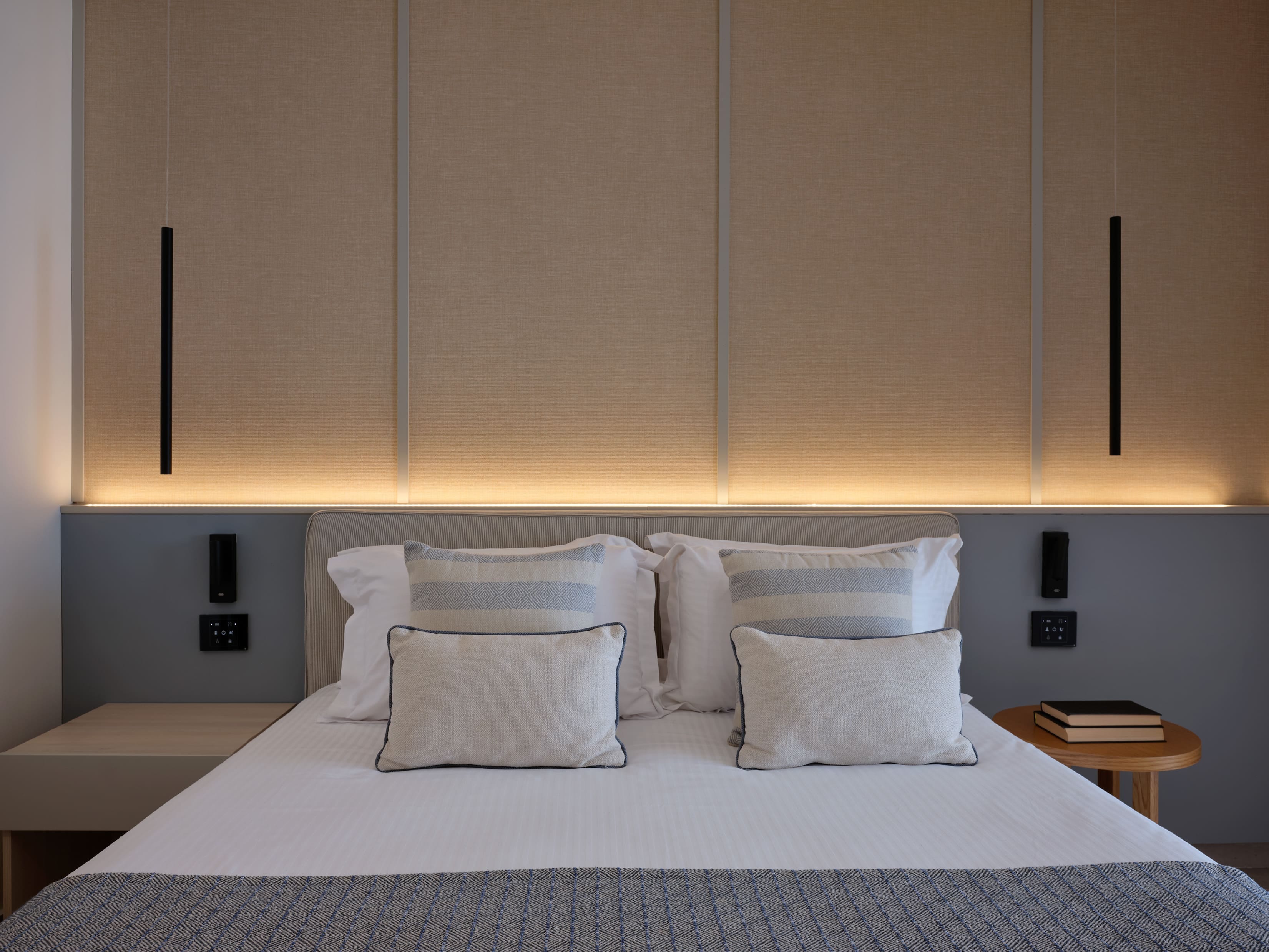 a bed with white pillows
