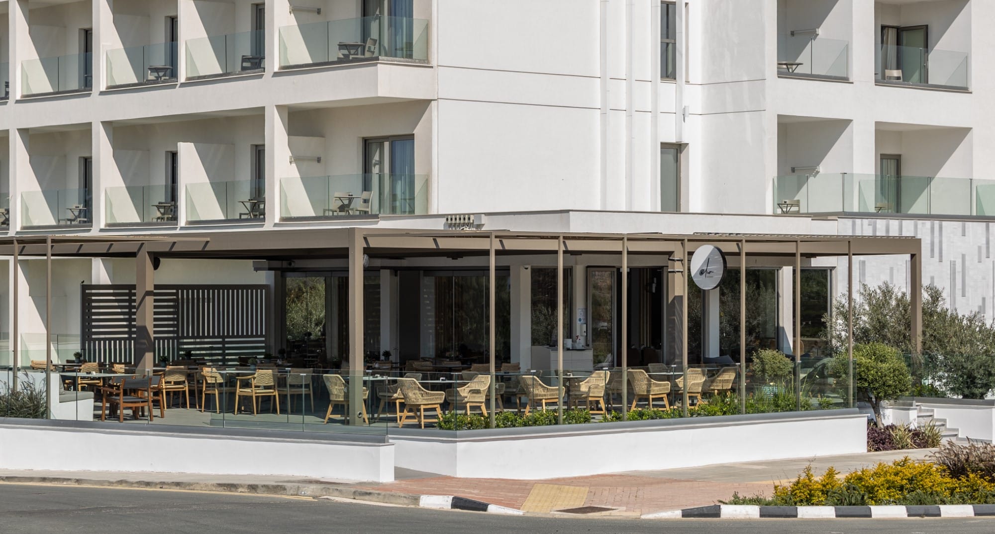 a building with tables and chairs outside