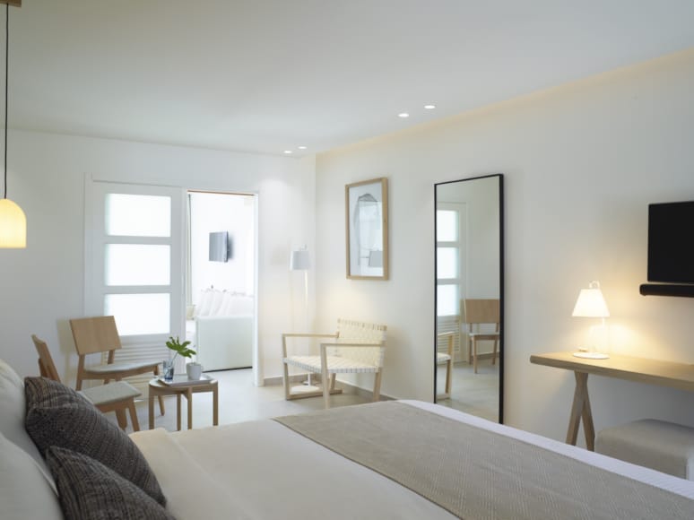 a room with a bed and a table