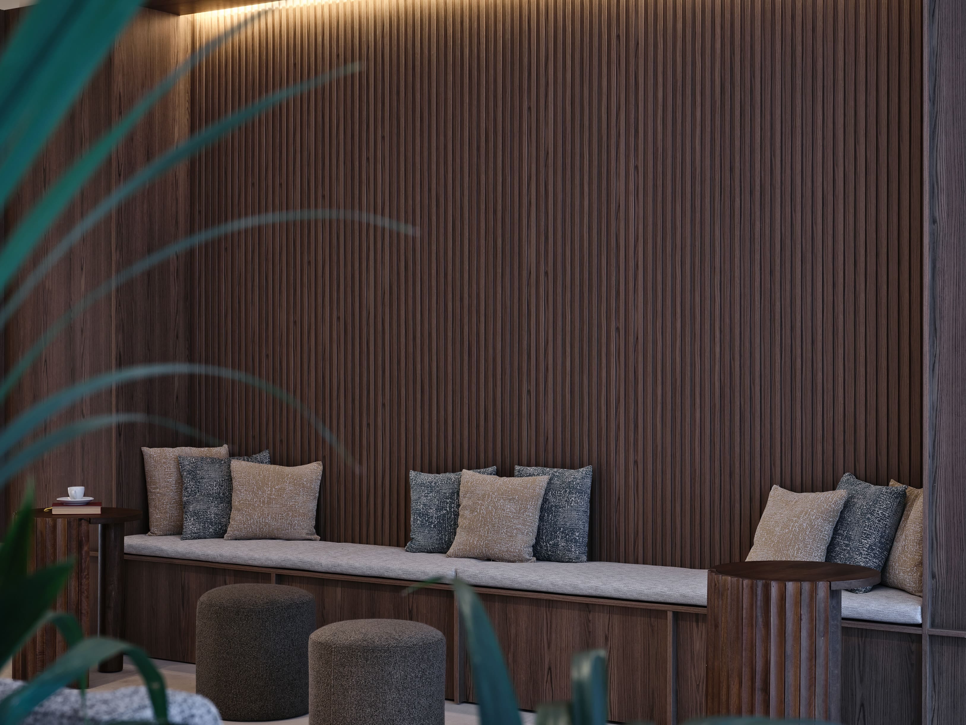 a bed with pillows and pillows