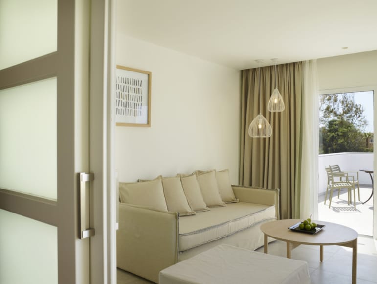 a living room with a couch and a table