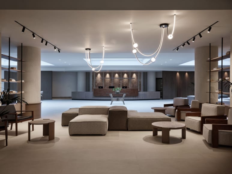a room with a large stage and chairs