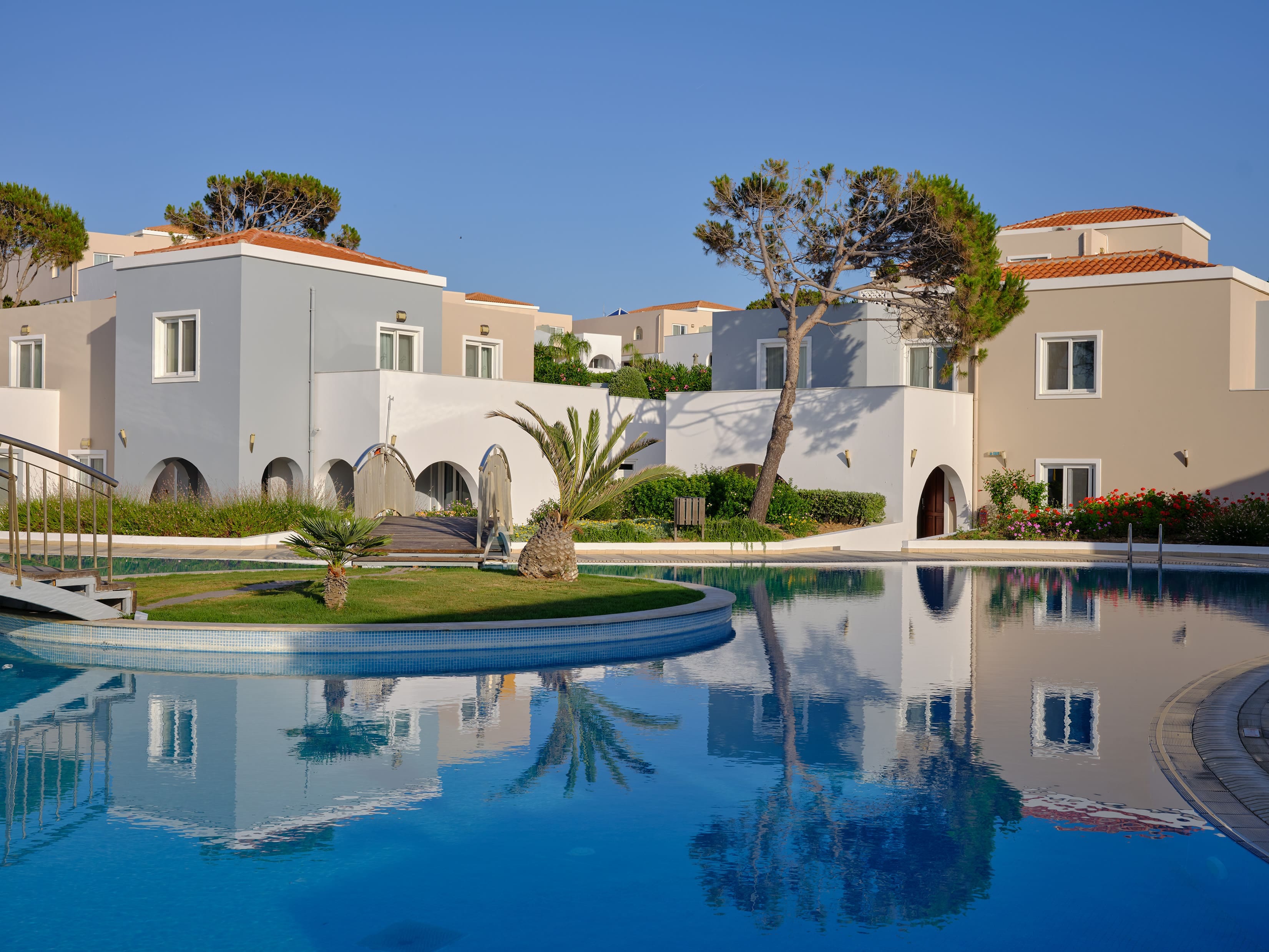 a pool with a building in the background