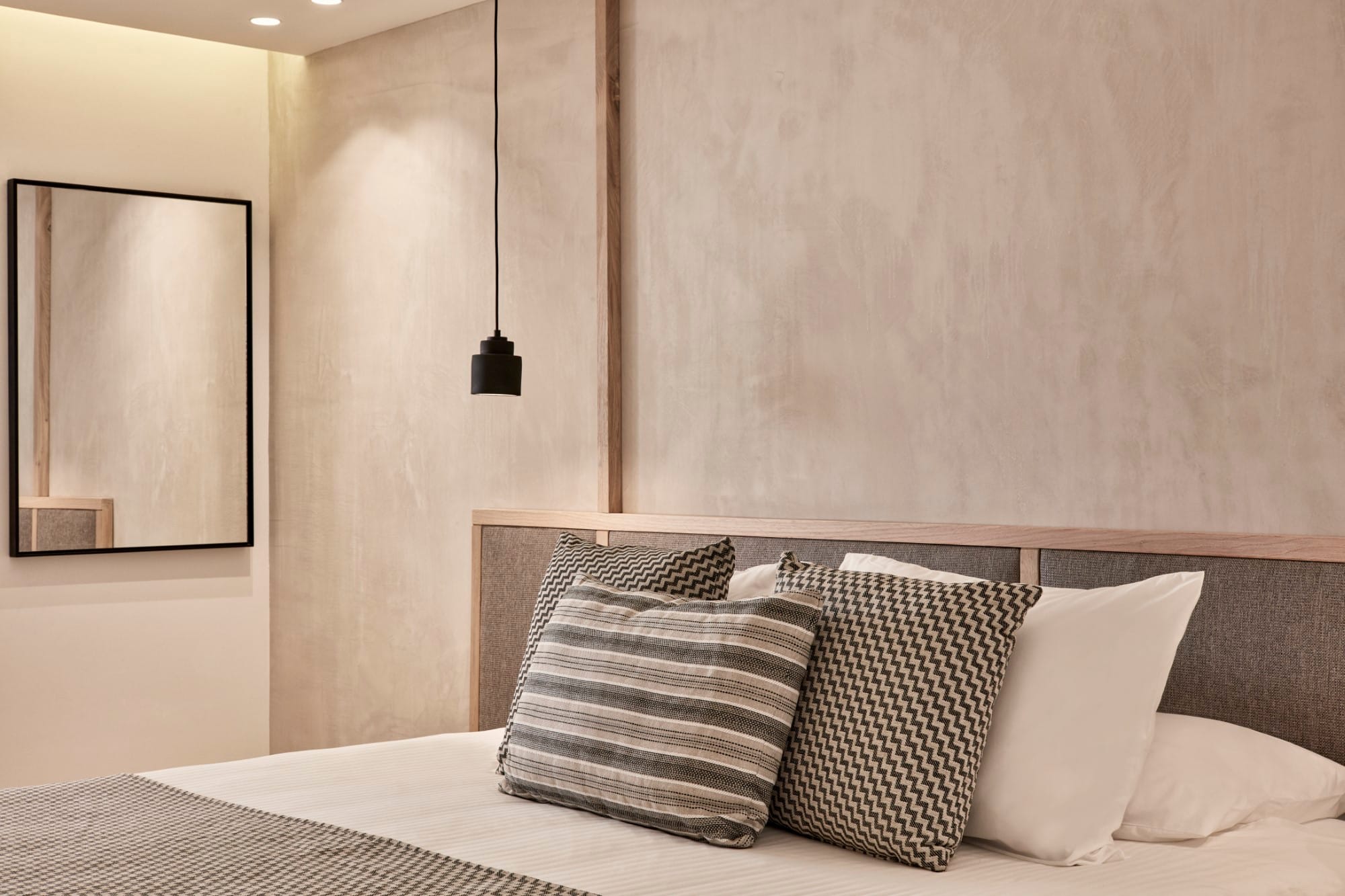 a bed with pillows