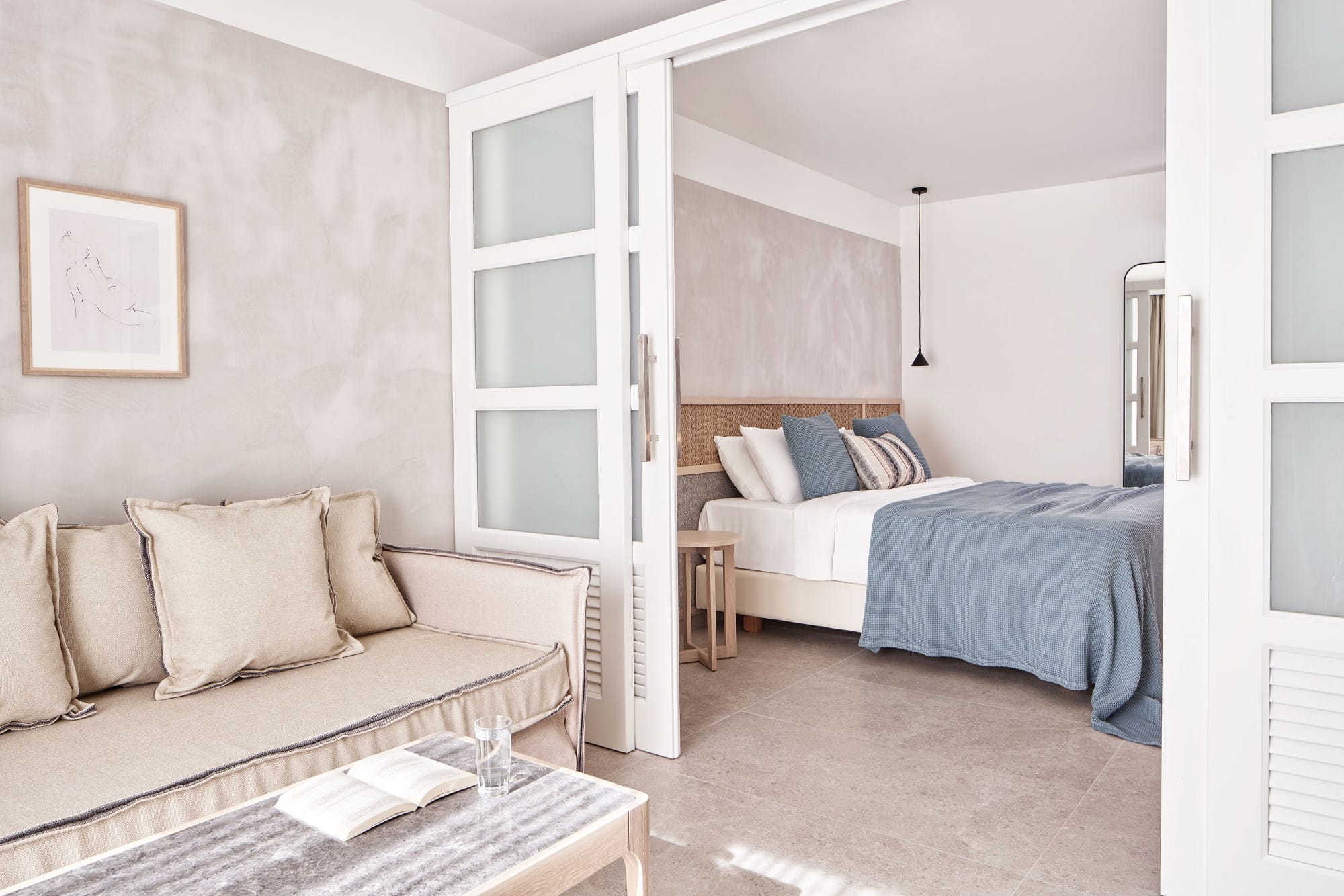 a room with a bed and a couch