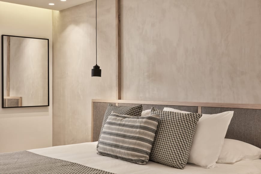 a bed with pillows