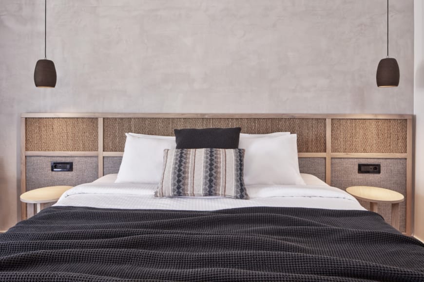 a bed with a black sheet