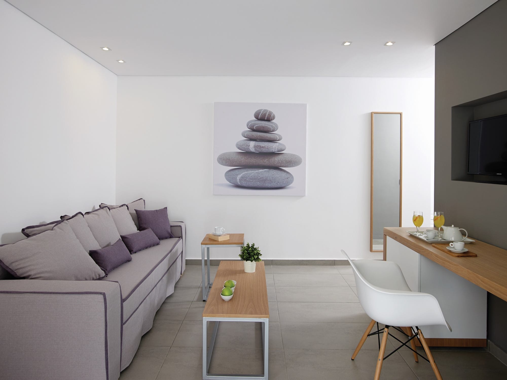 a living room with a couch and a table