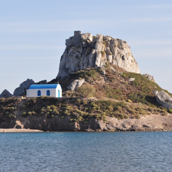 a house on a rocky island