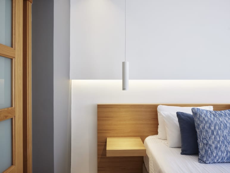 a bed with pillows