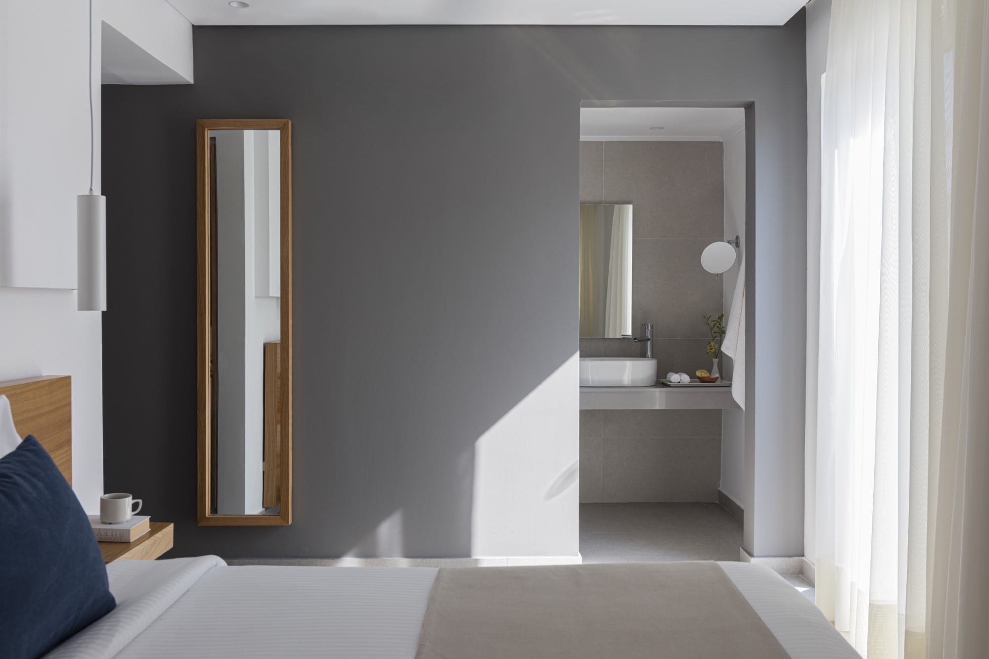 a bathroom with a large mirror