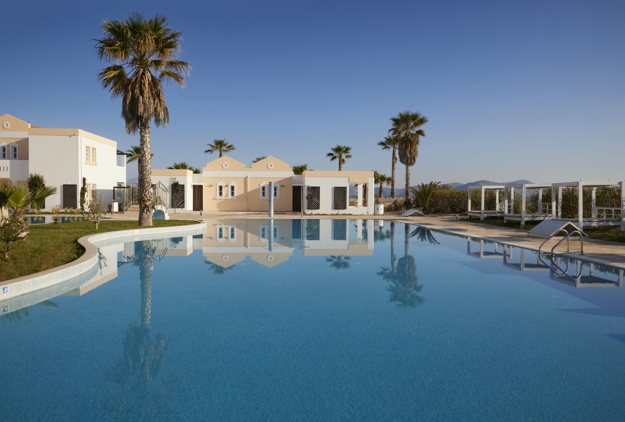 a pool of water with buildings around it