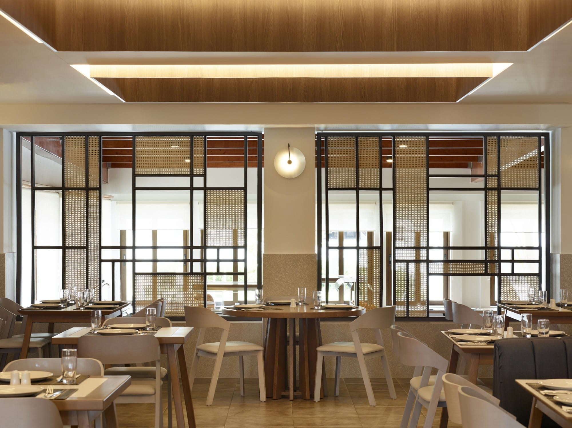 a room with tables and chairs