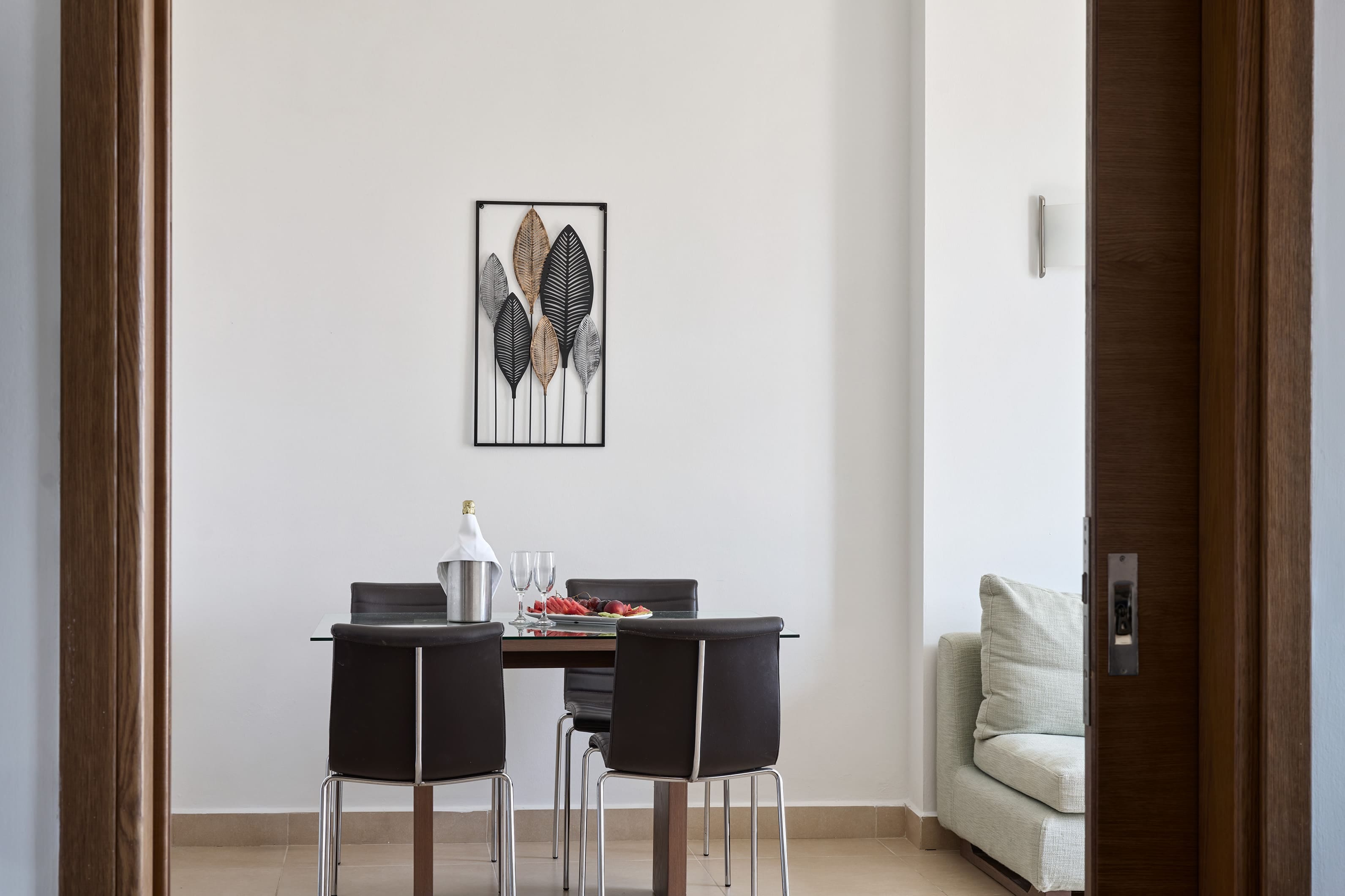 a desk with a chair and a chair in a room