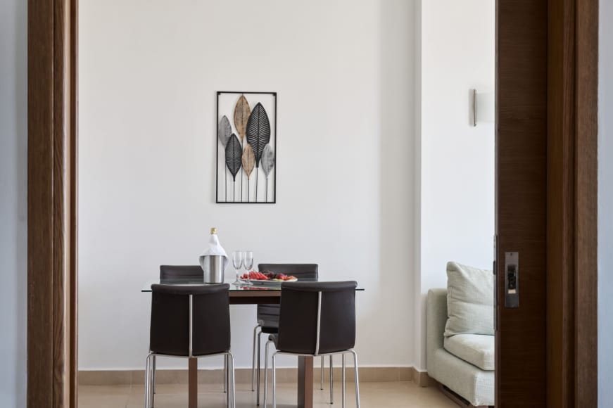 a desk with a chair and a chair in a room