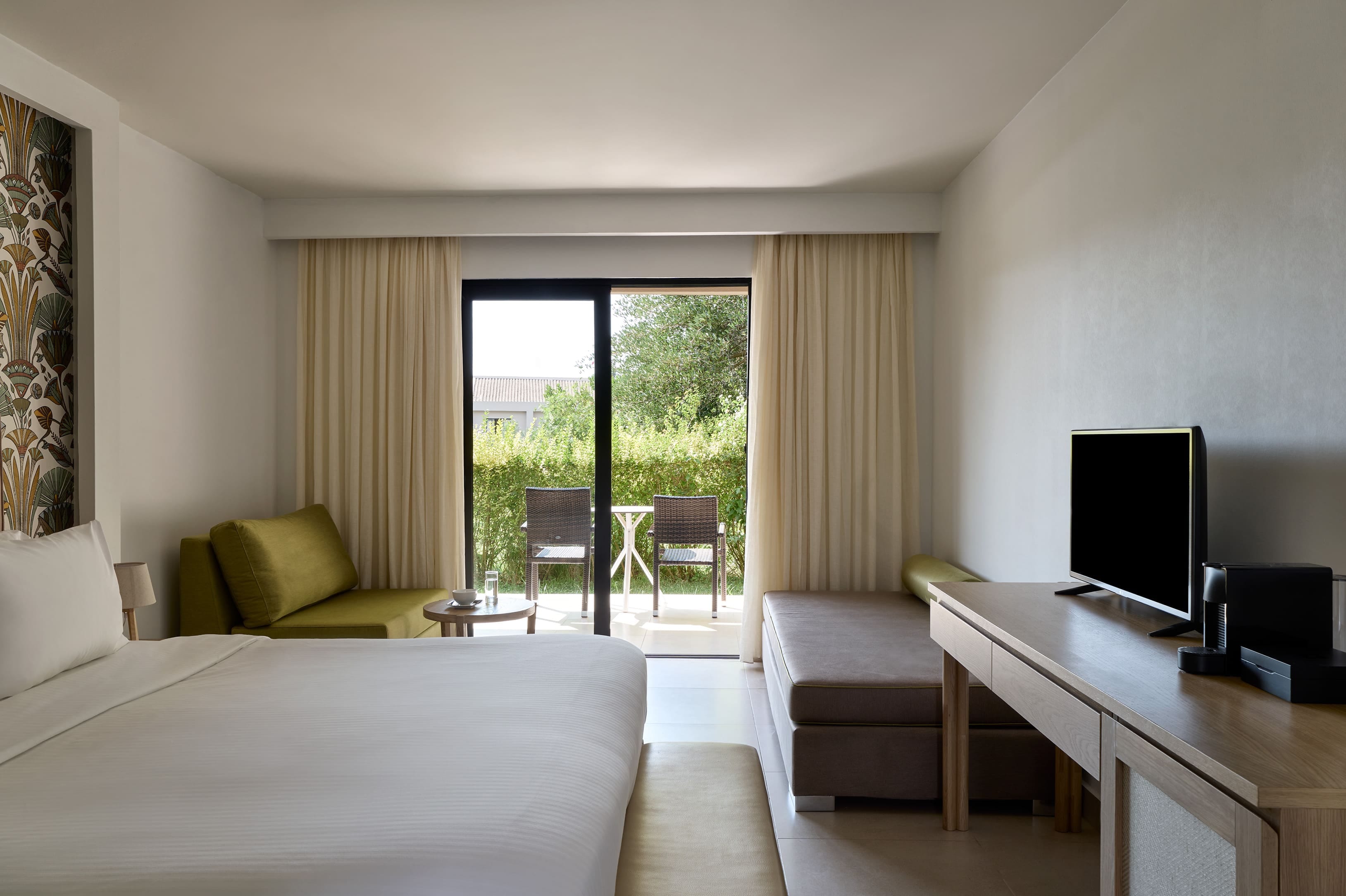 a room with a tv and couches