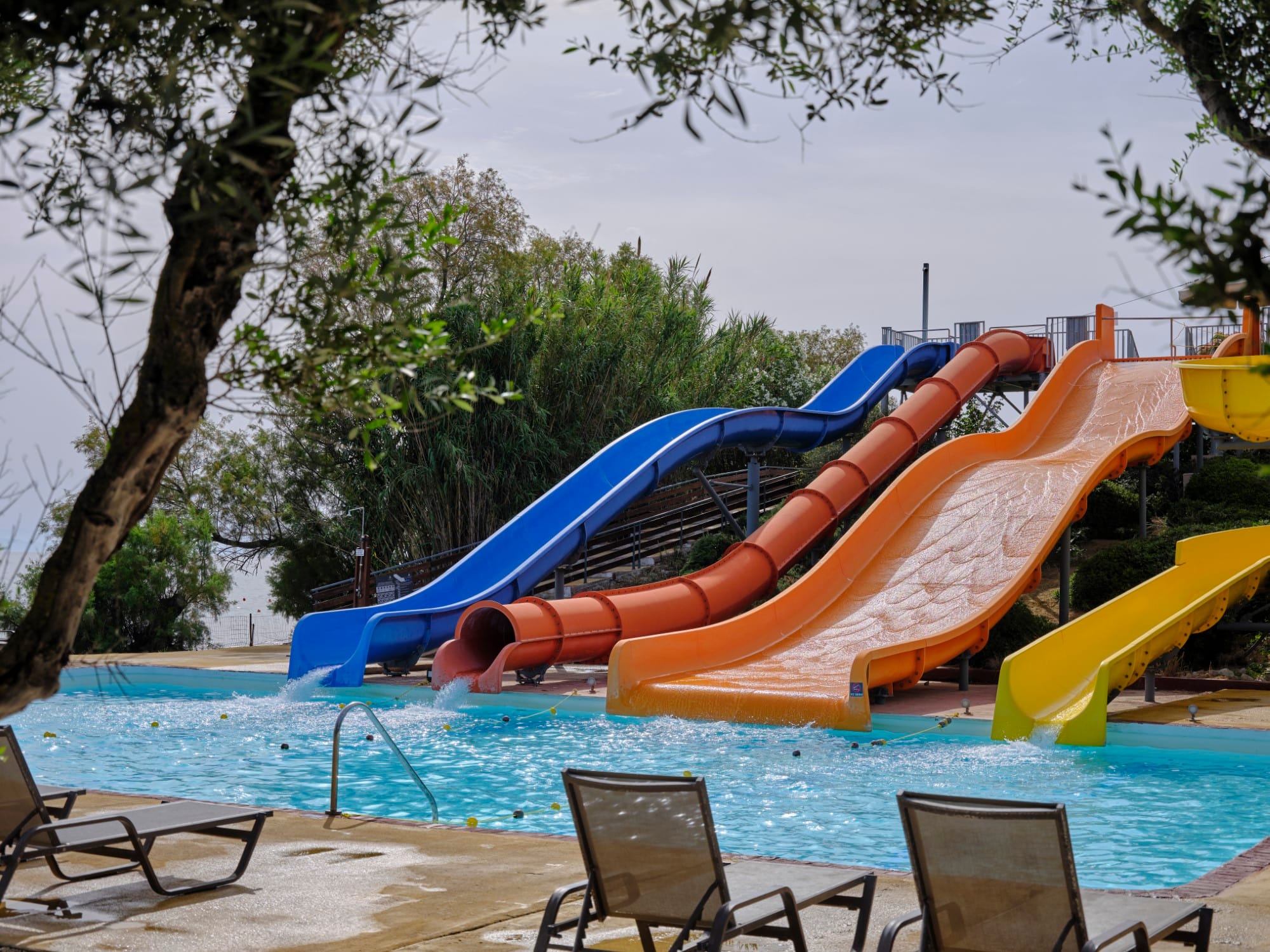 a person lying on a floating slide