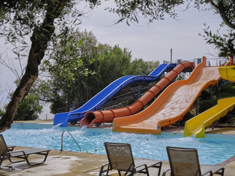 a person lying on a floating slide