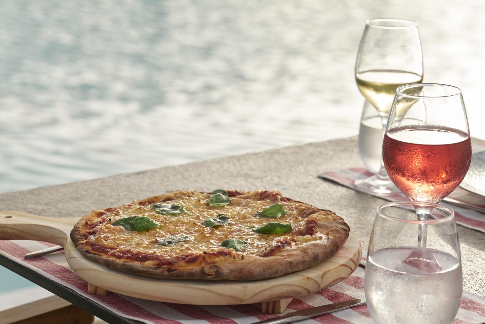 a pizza sits on a plate