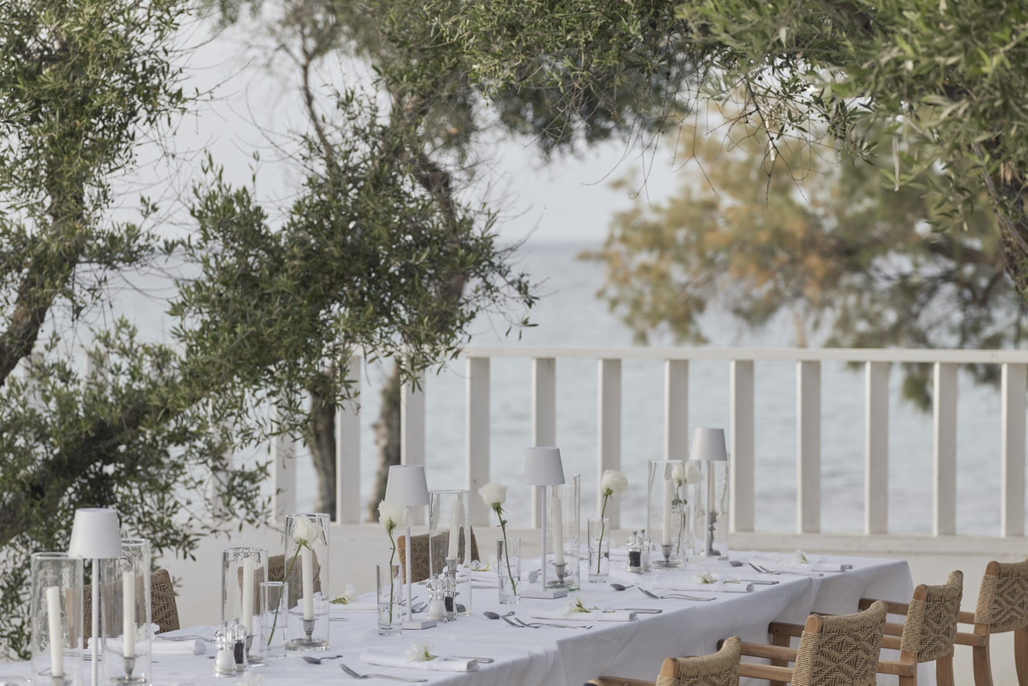 a group of tables and chairs outside