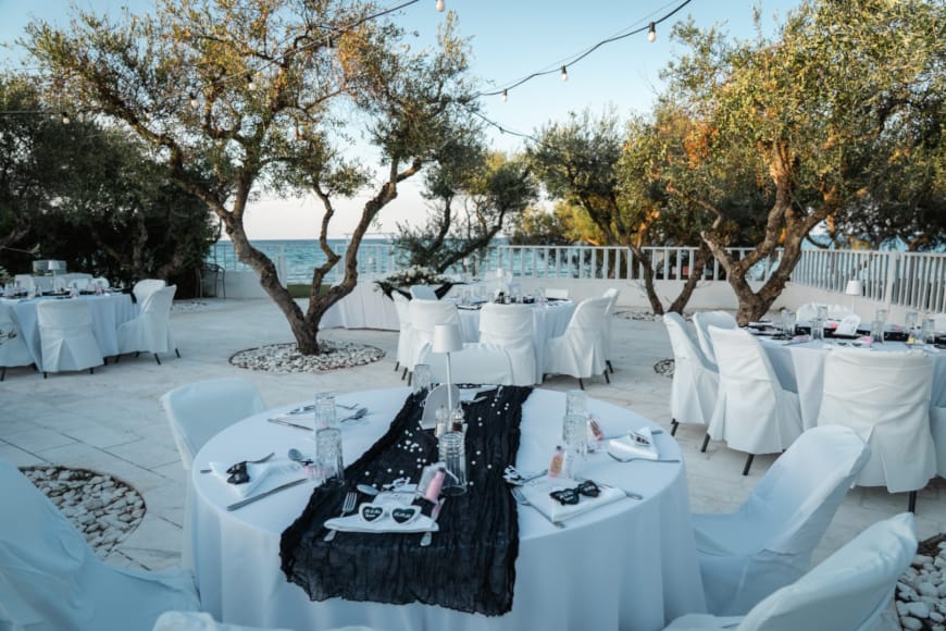 a set of tables and chairs outside