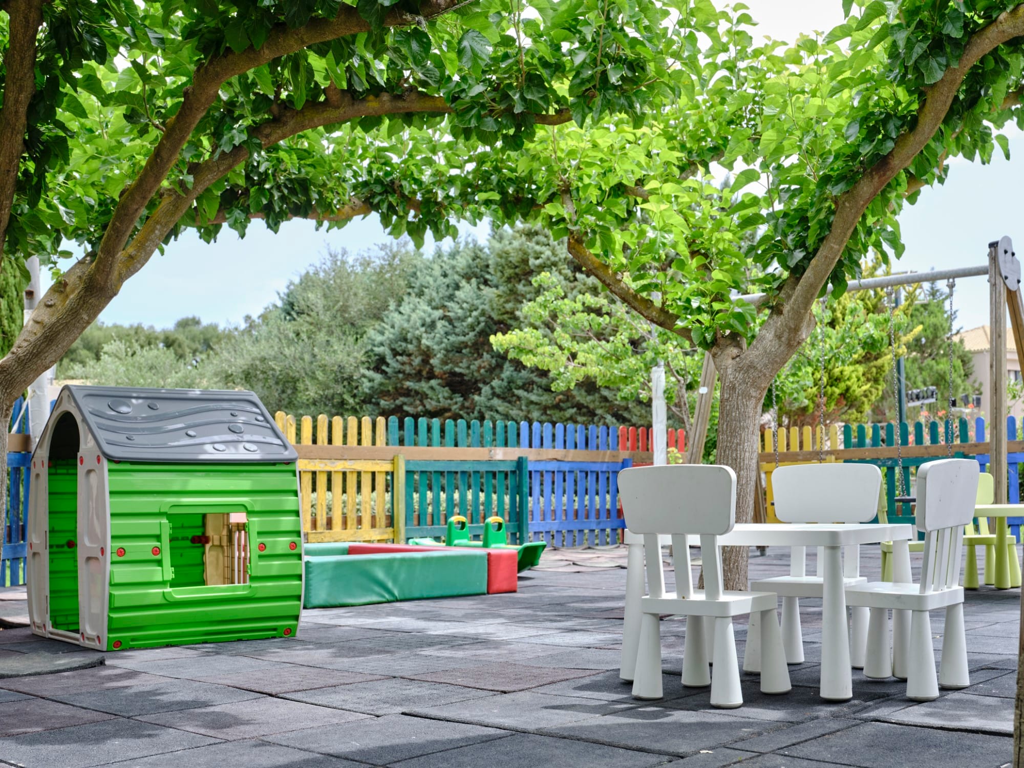 a group of chairs and tables outside