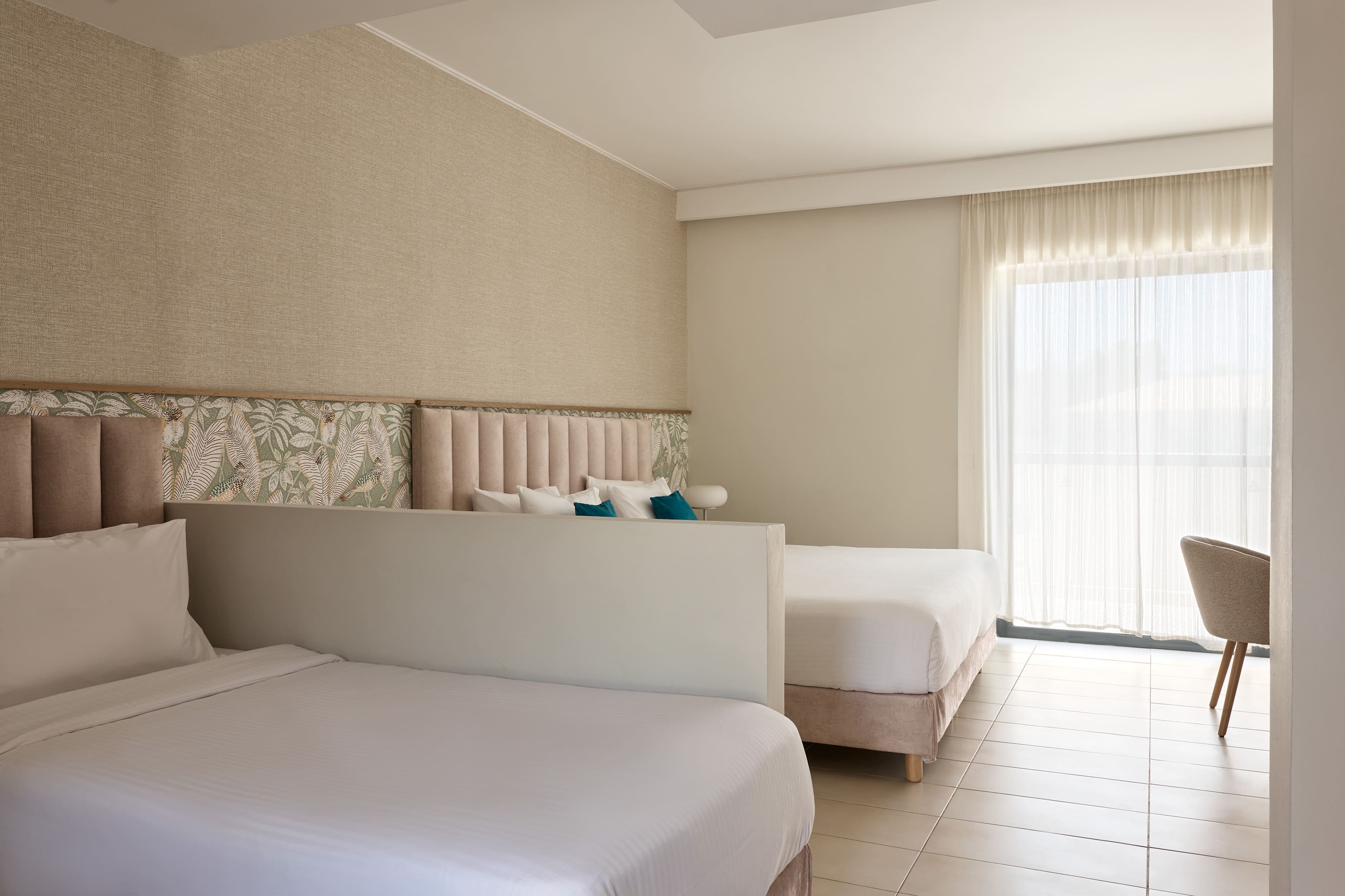 a room with a bed and a chair