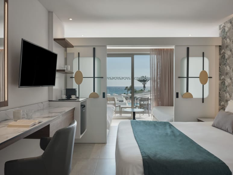 a hotel room with a large window