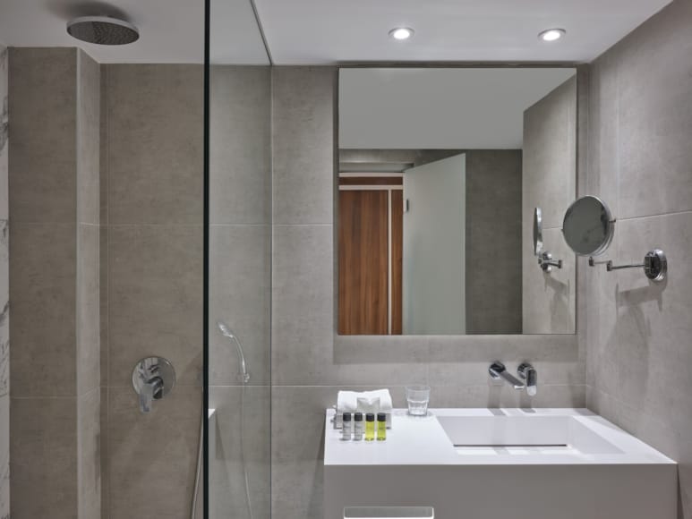 a bathroom with a large mirror