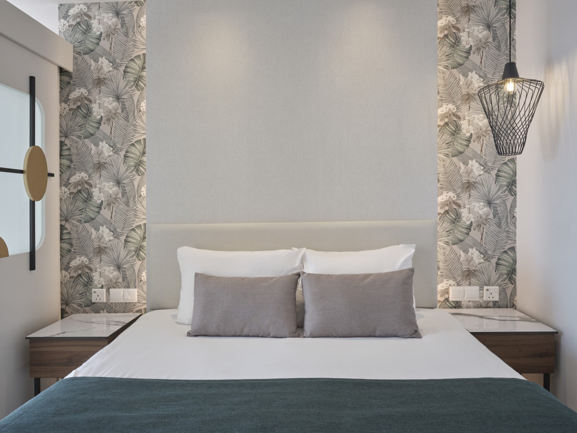 a bed with a white bed spread