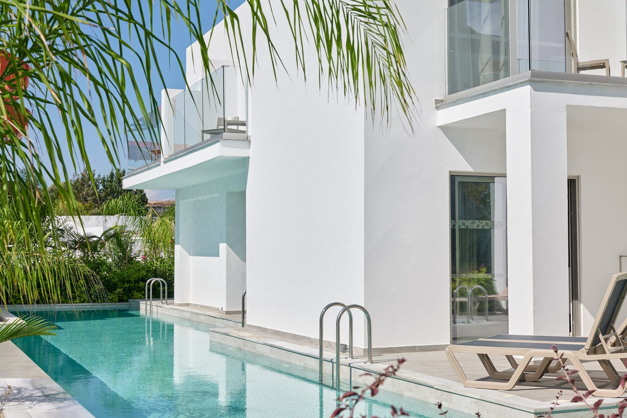 a swimming pool outside a house