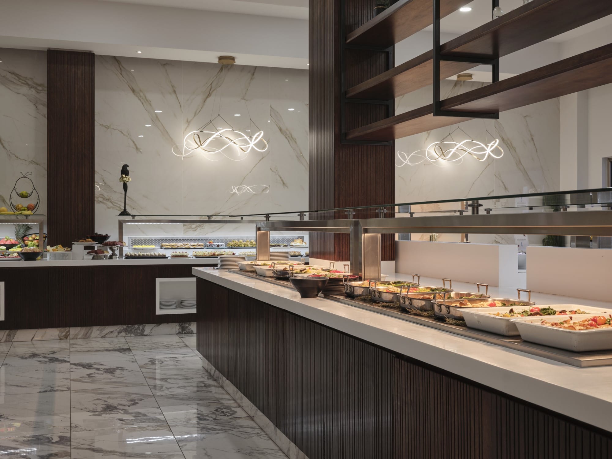 a large kitchen with food on the counter