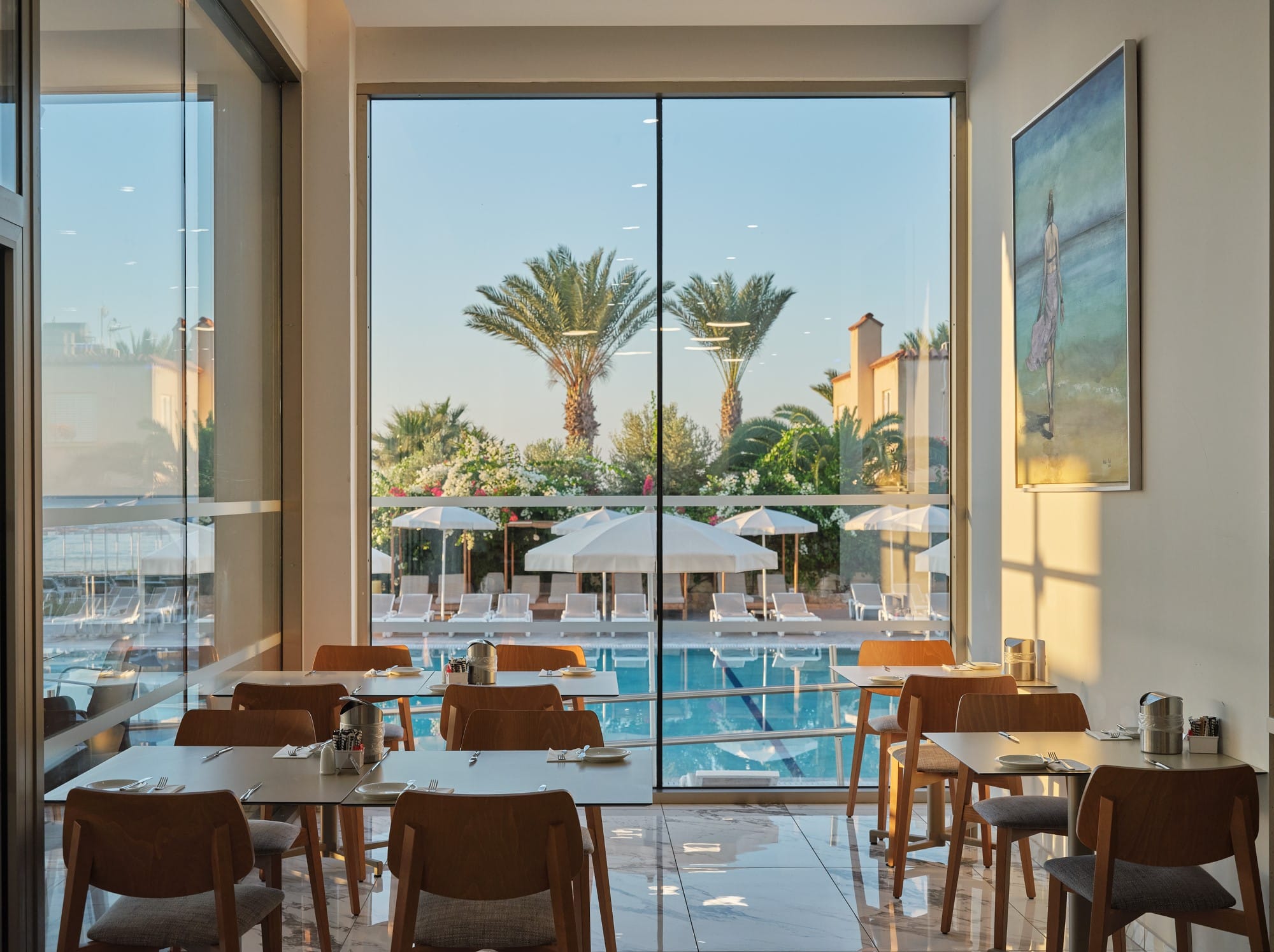 a room with tables and chairs