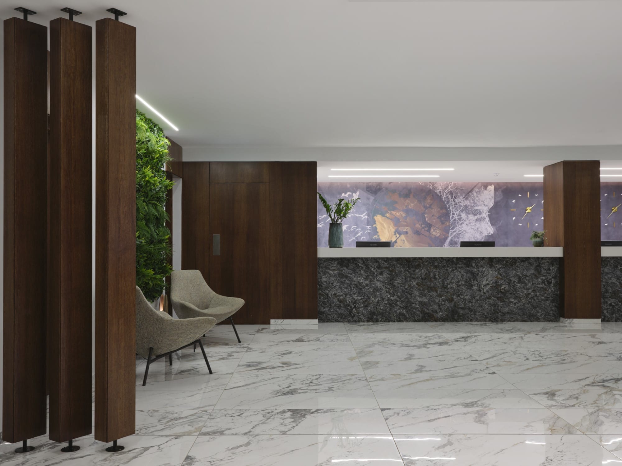 a room with a fireplace and chairs