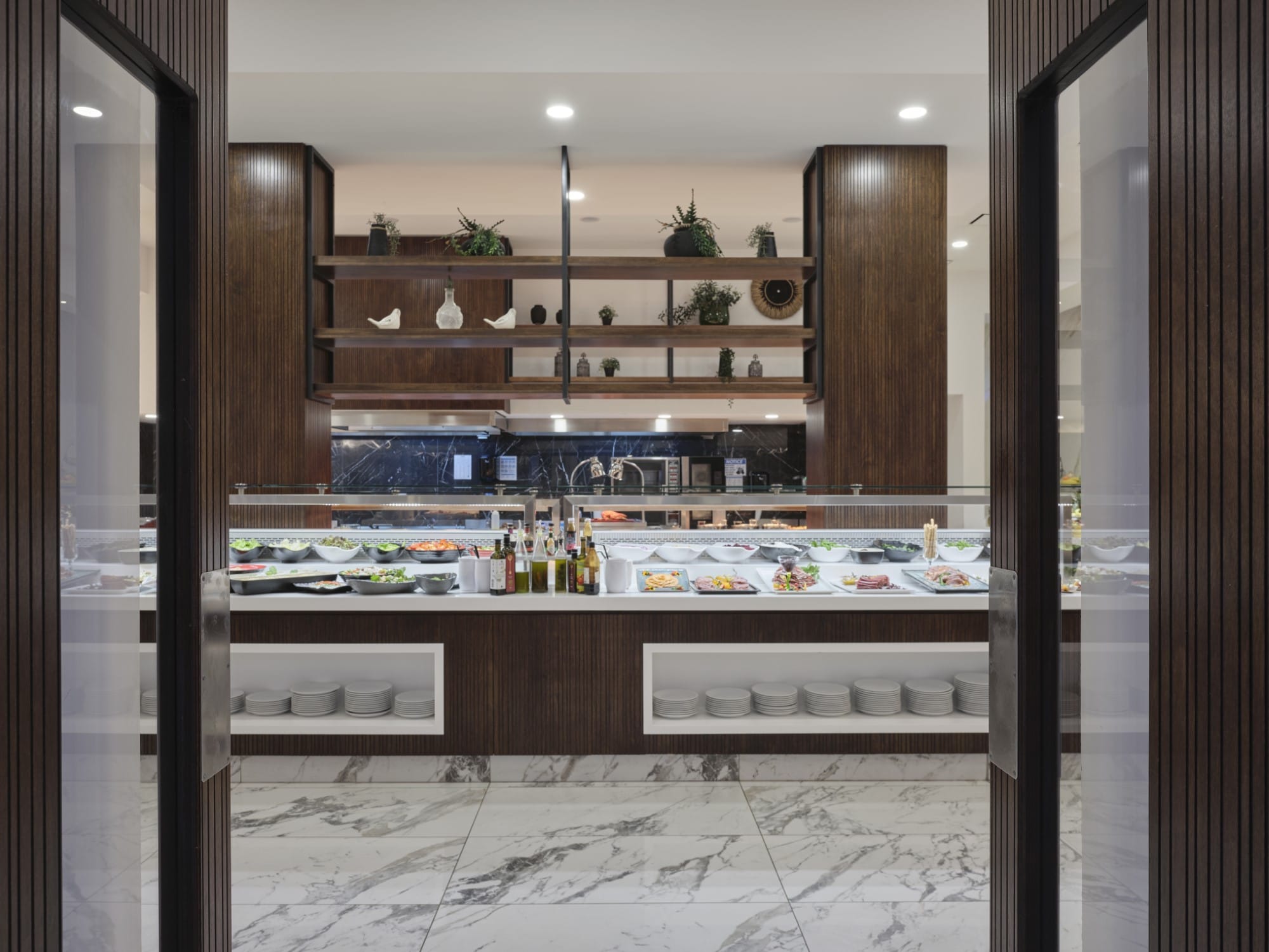 a room with a counter and shelves