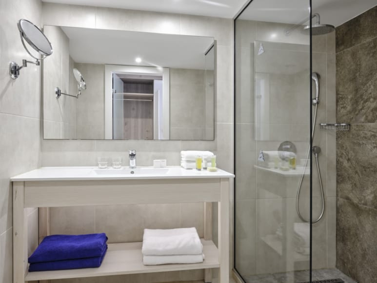 a bathroom with a glass shower