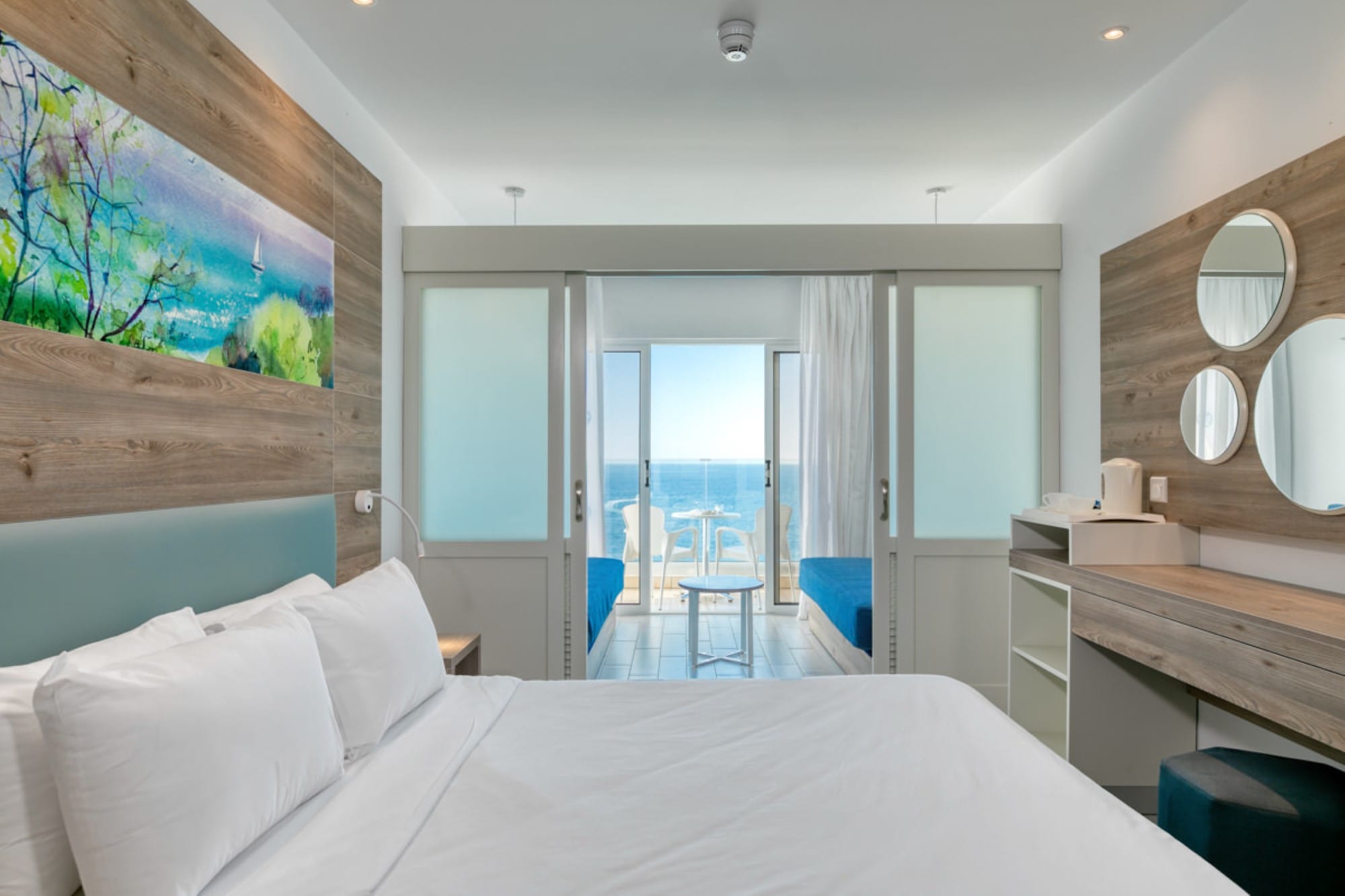 a bedroom with a large window