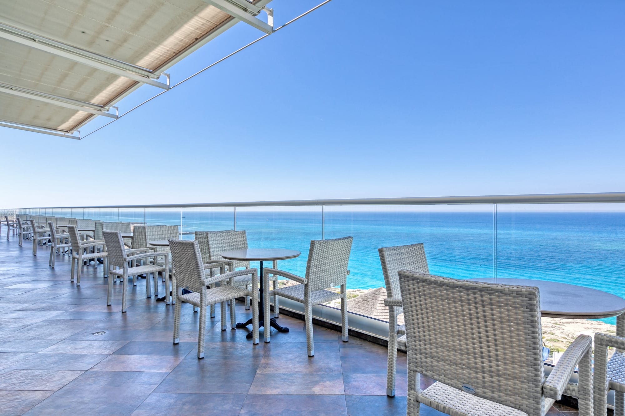 a table and chairs on a deck
